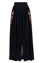 Click to visit Pantalones Hanne